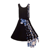 Zwarte kabelgebreide jurk met blauwe Schotse ruitdetails